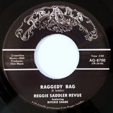 Reggie Saddler Revue : Raggedy Bag (7", Single, RE)