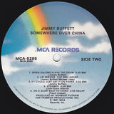 Jimmy Buffett : Somewhere Over China (LP, Album, Glo)