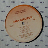 Lynyrd Skynyrd : Street Survivors (LP, Album, RE, Pin)