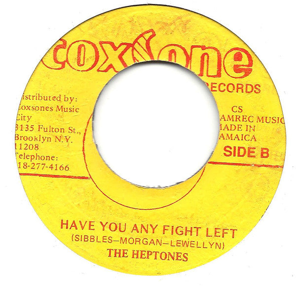 The Heptones : Suspicious Mind / Haven't You Any Fight Left (7", RE, Yel)