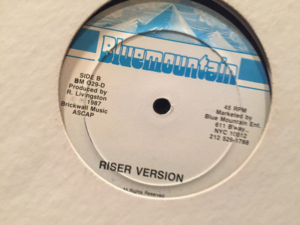 John Holt : She Is A Riser (12", Single)