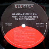 Grandmaster Flash And The Furious Five* : On The Strength (LP, Album)